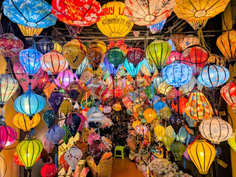 A sea of colourful, glowing lanterns in Hoi An, Vietnam. Beautiful to look at, but completely blinding if you are trying to find a single path forward. Illustrating how shiny object syndrome can distract from a business's sole focus. © Rik Lambert 2026