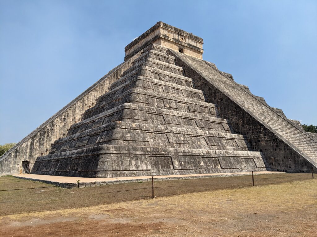 The structured stone tiers of Chichén Itzá symbolizing the step by step approach to sustainable business growth used in 1 on 1 business coaching.