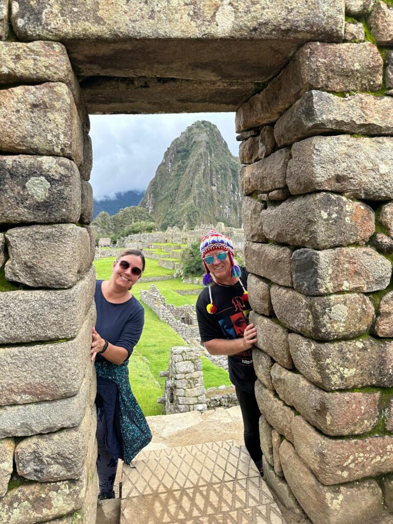 Gil Devlin and Rik Lambert at Machu Picchu, Peru, after building a a business that serves their life.