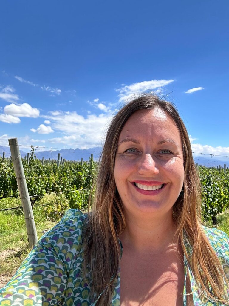 Business coach Gil Devlin at the Ojo de Agua vineyard in Mendoza overlooking the Andes, supporting your business growth and strategic focus.
