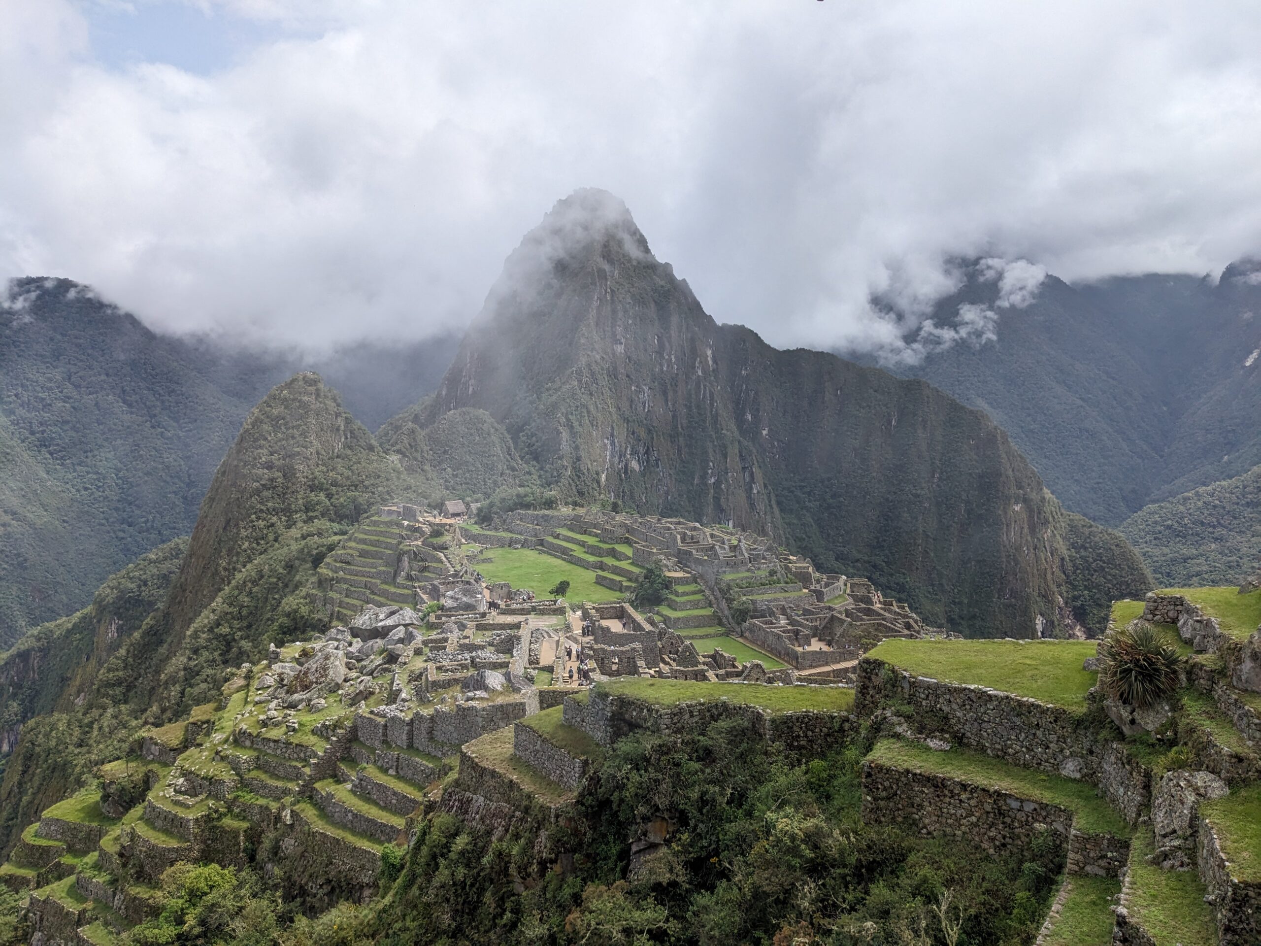 Panoramic elevated view of Machu Picchu representing strategic oversight in one on one business coaching.